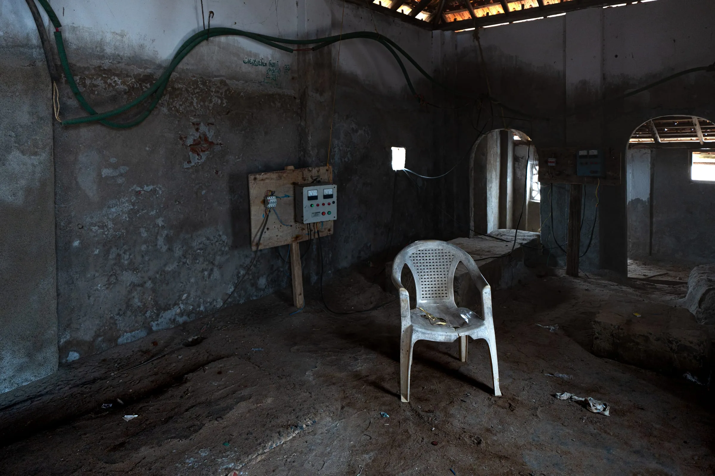 An office complex at a salt pan in Thiruppullani, Tamil Nadu, India. The administrative area is used to maintain labor records and inventory logs. It also serves as a space where workers meet officials, collect wages, and address attendance or contractor-related matters.